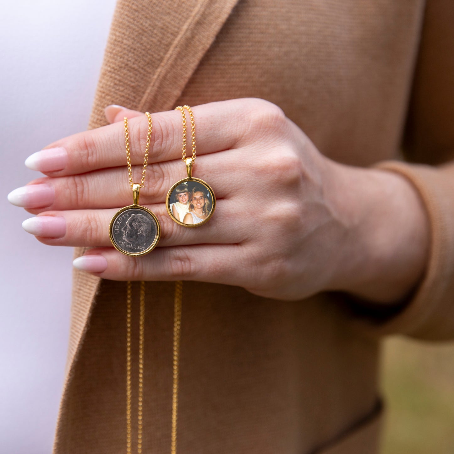 Displaying the front and back of the Lucky Dime necklace. It features a dime on the front and a personalized photo.