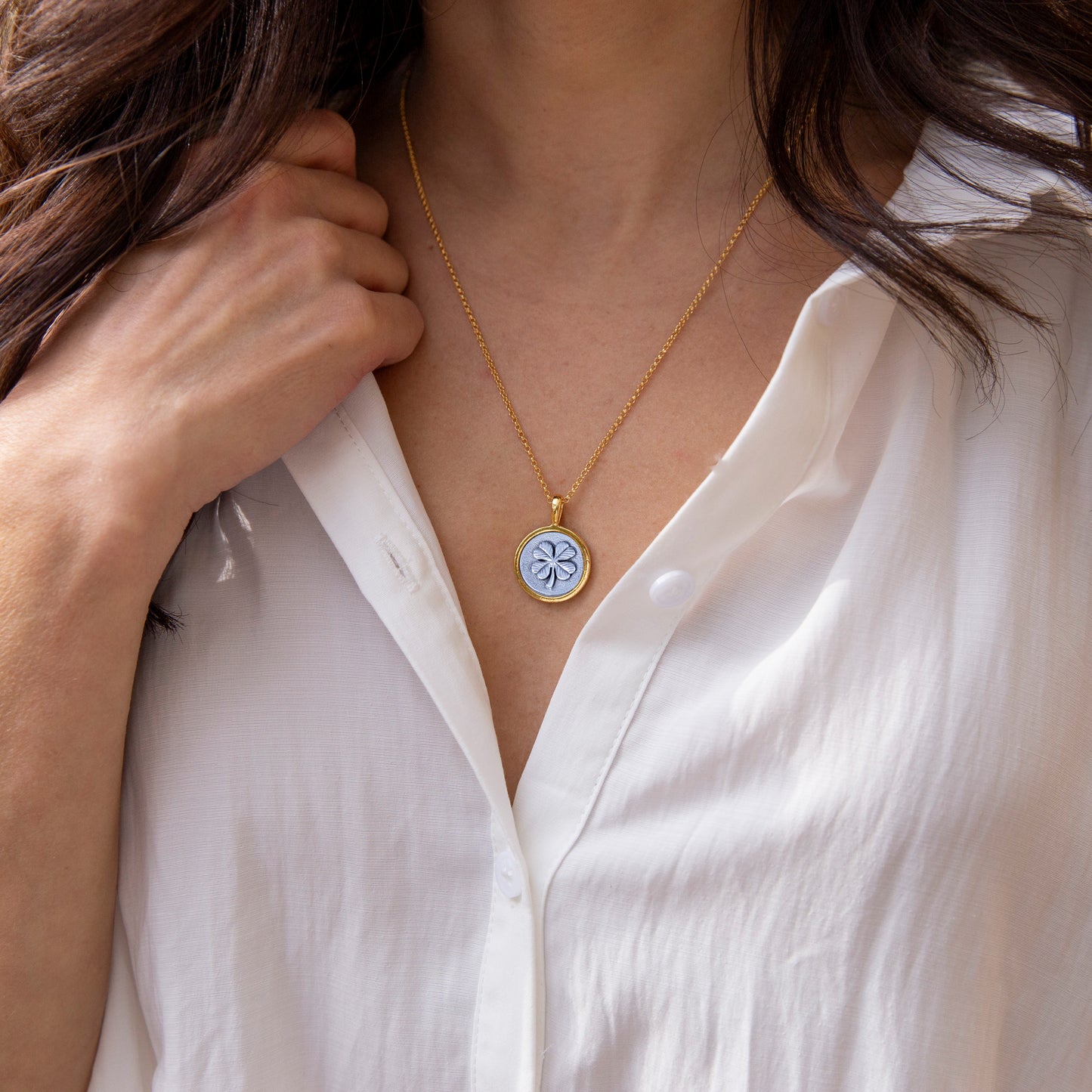 Model is wearing Four Leaf Personalized Necklaces in gold