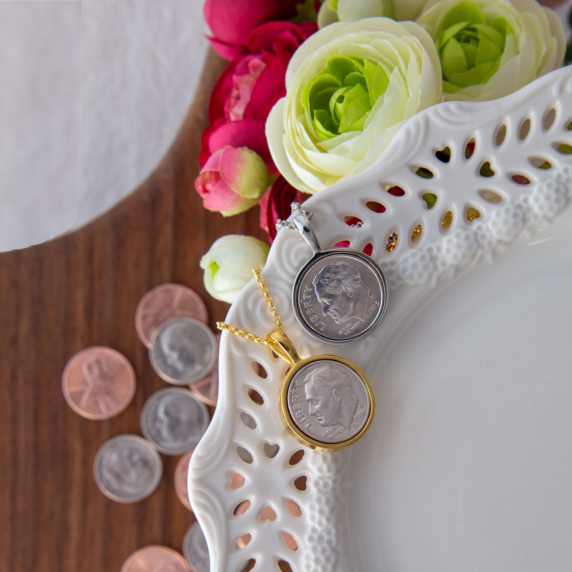 two Lucky Dimes Personalized necklaces with coins in the background